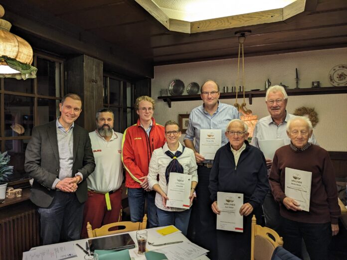 v.l. Oberbürgermeister Prof. Dr. Ulli Meyer, Sebastian Grub, Vorsitzender des DLRG Bezirks Homburg, und Johannes Rohe, Vorsitzender der DLRG St. Ingbert.